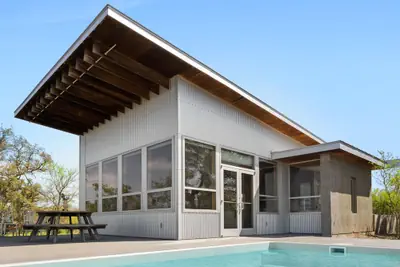 Photo 2 - Luxury Riverfront Retreat | 6 Cabins | Private Pool