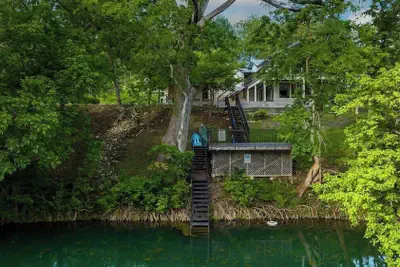 Photo 2 - Luxury Riverfront Villa With Firepit & Gameroom!