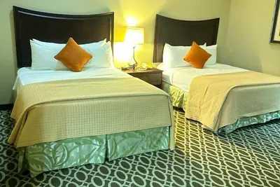 Photo 2 - Sunday House Inn and Suites