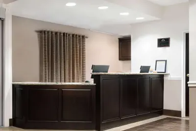 Photo 2 - Days Inn & Suites by Wyndham Dallas