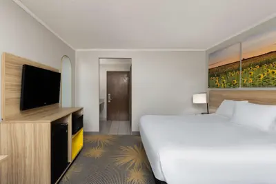 Photo 2 - Days Inn & Suites by Wyndham Kansas City South