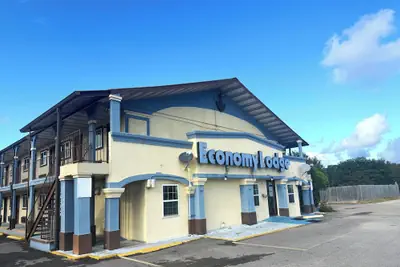 Photo 2 - Economy Lodge by Hotel O Texas City