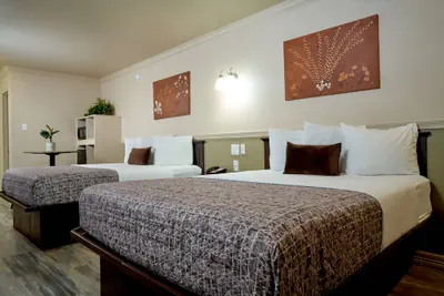 Photo 2 - Family Garden Inn & Suites