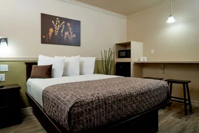 Photo 4 - Family Garden Inn & Suites
