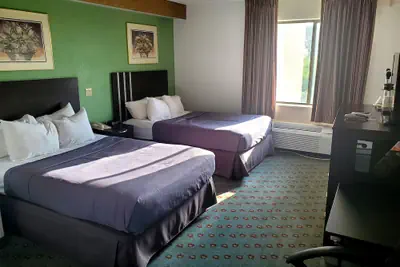 Photo 3 - Pleasant Stay Inn & Suites