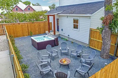 Photo 2 - Luxury Escape at The Noir: 3br, Hot Tub, & Steps From Main St!