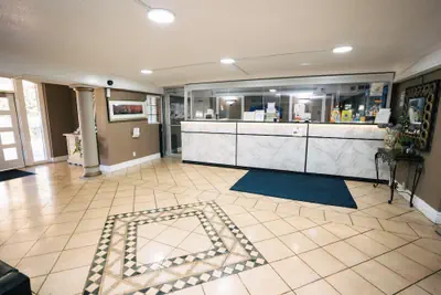 Photo 2 - Guest Inn & Suites