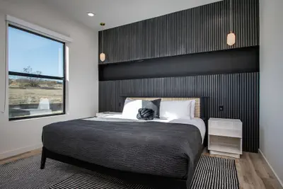 Photo 5 - Luxe Modern Escape w Pool Hot Tub Firepit Desert View Lassen by Avantstay