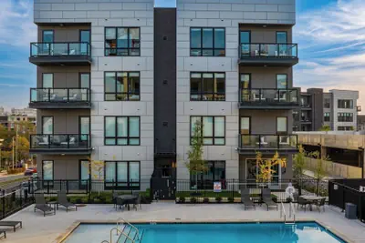 Photo 2 - Sleeps 18 3 Modern Midtown Apartments w/ Gym + Pool Walkable to Shops & Eats