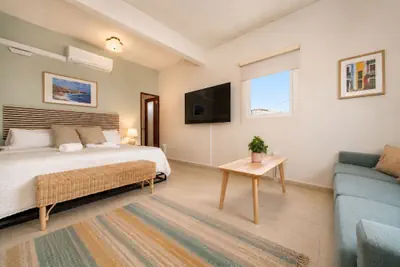Photo 2 - Room 16: Grand King Suite w/ Desk & Sofa Bed