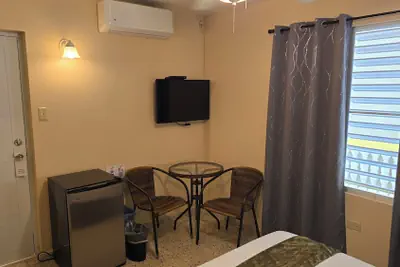 Photo 5 - I Love Combate Rooms & Suites