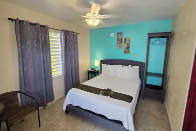 Photo 4 - I Love Combate Rooms & Suites