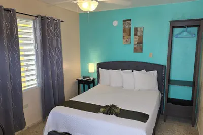 Photo 3 - I Love Combate Rooms & Suites