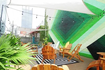 Photo 3 - Sleeps 8 Stylish Sobro Suites, Walk to Dining, Drinks & More by Avantstay