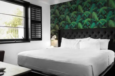 Photo 2 - Sleeps 8 Stylish Sobro Suites, Walk to Dining, Drinks & More by Avantstay