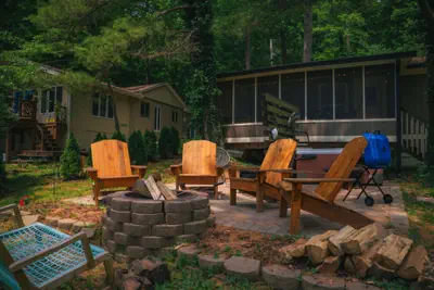 Photo 4 - Cozy Cabin on Lake Front With Hot tub Firepit