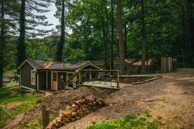 Photo 2 - Cozy Cabin on Lake Front With Hot tub Firepit