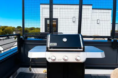 Photo 3 - Luxe 4BR With Fire Pit Grill and City Views