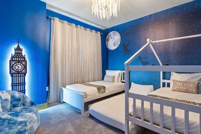 Photo 3 - Contemporary 4BR Townhome With Pool & Themed Rooms