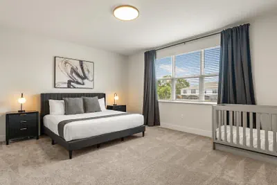 Photo 2 - Contemporary 4BR Townhome With Pool & Themed Rooms