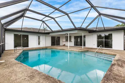 Photo 3 - Riverfront Home w Private Dock Pool Beaches
