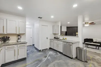 Photo 4 - Elite 5BR Home With Game Room, Hot Tub, & Sauna