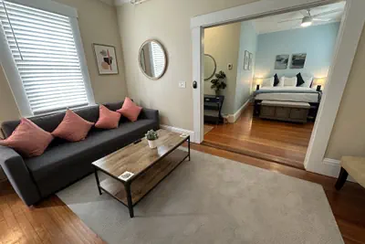 Photo 2 - Exposed Brick Suite 1 Bed/ 1 Bath/ Pullout Sofa 1 Bedroom Apts