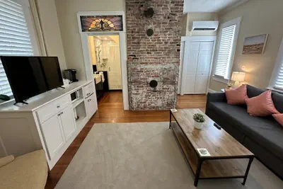 Photo 5 - Exposed Brick Suite 1 Bed/ 1 Bath/ Pullout Sofa 1 Bedroom Apts