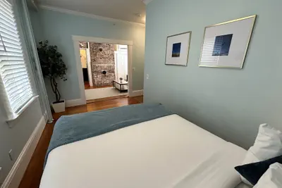 Photo 4 - Exposed Brick Suite 1 Bed/ 1 Bath/ Pullout Sofa 1 Bedroom Apts