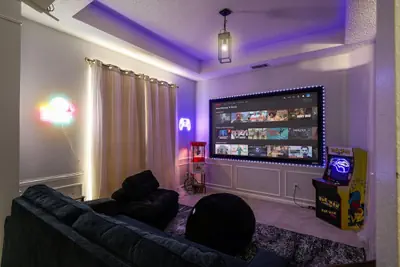 Photo 3 - Bright & Cozy 4BR Home w Movie Room & Backyard