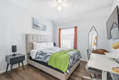 Photo 5 - Bright & Cozy 4BR Home w Movie Room & Backyard