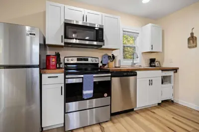 Photo 3 - Cozy 1BR Cottage w Firepit Close to Downtown