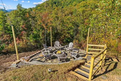 Photo 3 - 5B 4B Luxe Cabin w Hot Tub Firepit Game Room