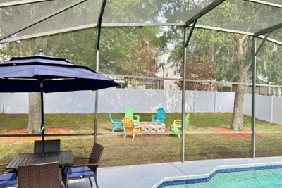 Photo 4 - Stunning 4BR Pool Home Your Private Oasis Awaits