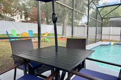 Photo 2 - Stunning 4BR Pool Home Your Private Oasis Awaits