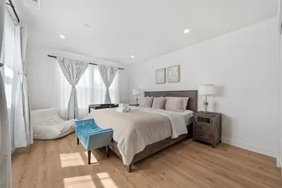 Photo 4 - Spacious 8BR Home with AC & Parking