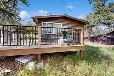 Photo 2 - Ideal Vacation Home With Wraparound Deck & Rocky Mountain View
