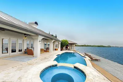 Photo 2 - Luxe Lakefront Retreat With Private Pool, Spa, Lakeside Terrace, Gourmet Kitchen