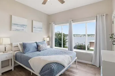 Photo 4 - Lakefront Updated Condo at 2mm w/ 2 Pools, Hot Tub, Boat Slip