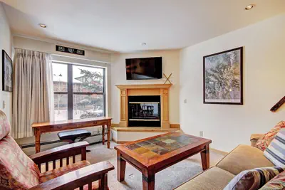 Photo 2 - Quaint Winter Hideaway Sleeps 6- Across From Vibrant Main St 2 Bedroom Condo by RedAwning