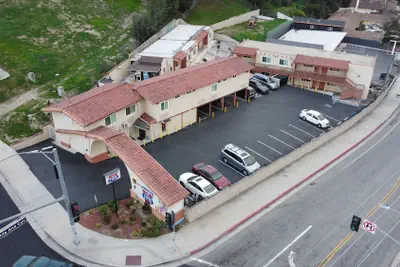 Photo 2 - New American Inn and Suites