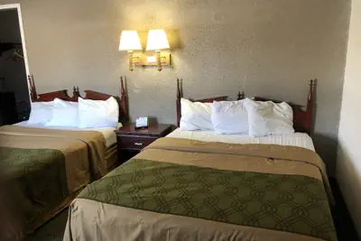 Photo 3 - Posh Inn & Suites
