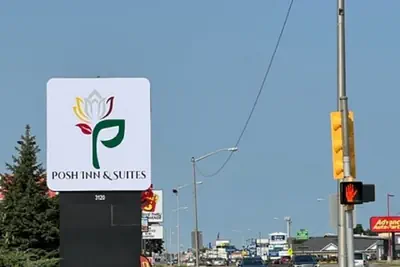 Photo 2 - Posh Inn & Suites