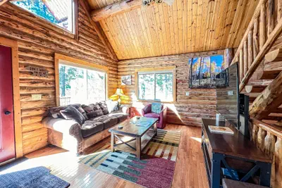 Photo 5 - Log cabin with fireplace, minutes from skiing, snowmobiling, xc ski, and more!