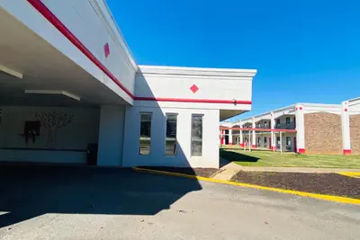 Photo 2 - Traveler's Place Inn & Suites