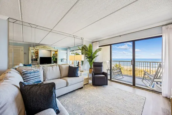Photo 1 - Tastefully Decorated Condo with Scenic Beach Views