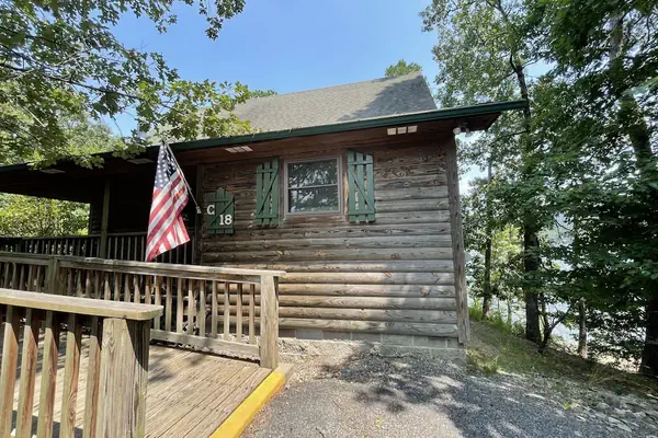 Photo 1 - Lake view two bedroom, two bath loft, log-sided cottage with private hot tub overlooking Lake Ouachita. by RedAwning