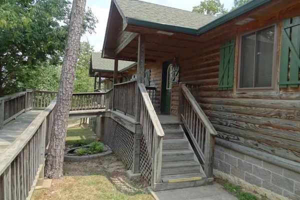Photo 1 - C16, Two bedroom, two bath, log-sided Harbor North luxury cottage with hot tub overlooking Lake Ouachita. by RedAwning