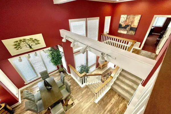 Photo 1 - 80BPD, Four bedroom, two 1/2 bath log-sided condo with lake view , garage by RedAwning