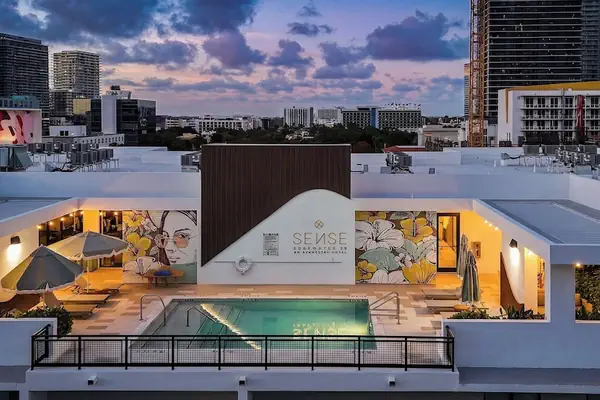 Photo 1 - Sleeps 12 2 Suites in New Luxury Hotel w/ Rooftop Pool Sense28 by Avantstay